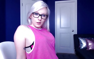 Misbehaving blond teenybopper poses in a homemade webcam let off